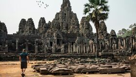 Angkor Thom Temple and birds on the sky, Siem Reap